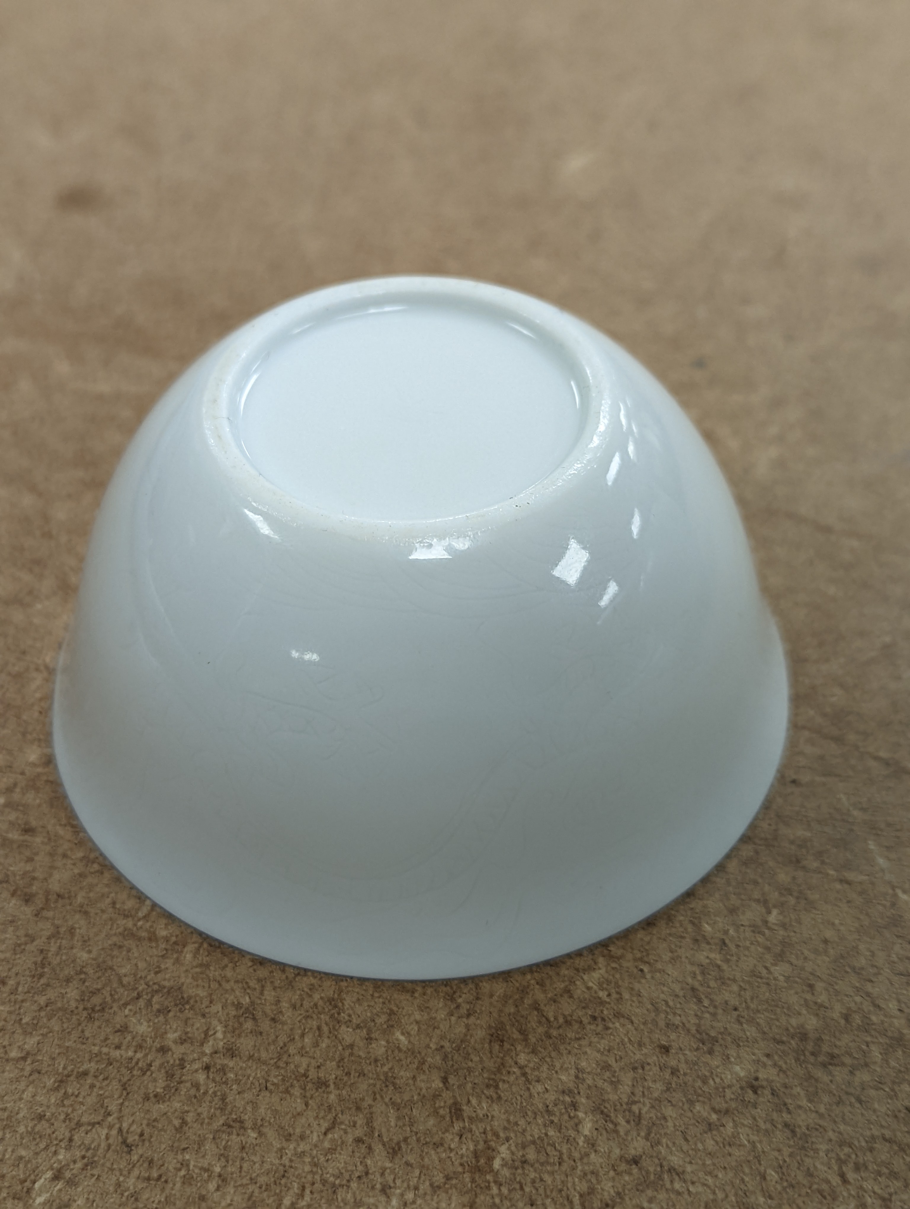 A Chinese white glazed water pot and a similar cup (2)